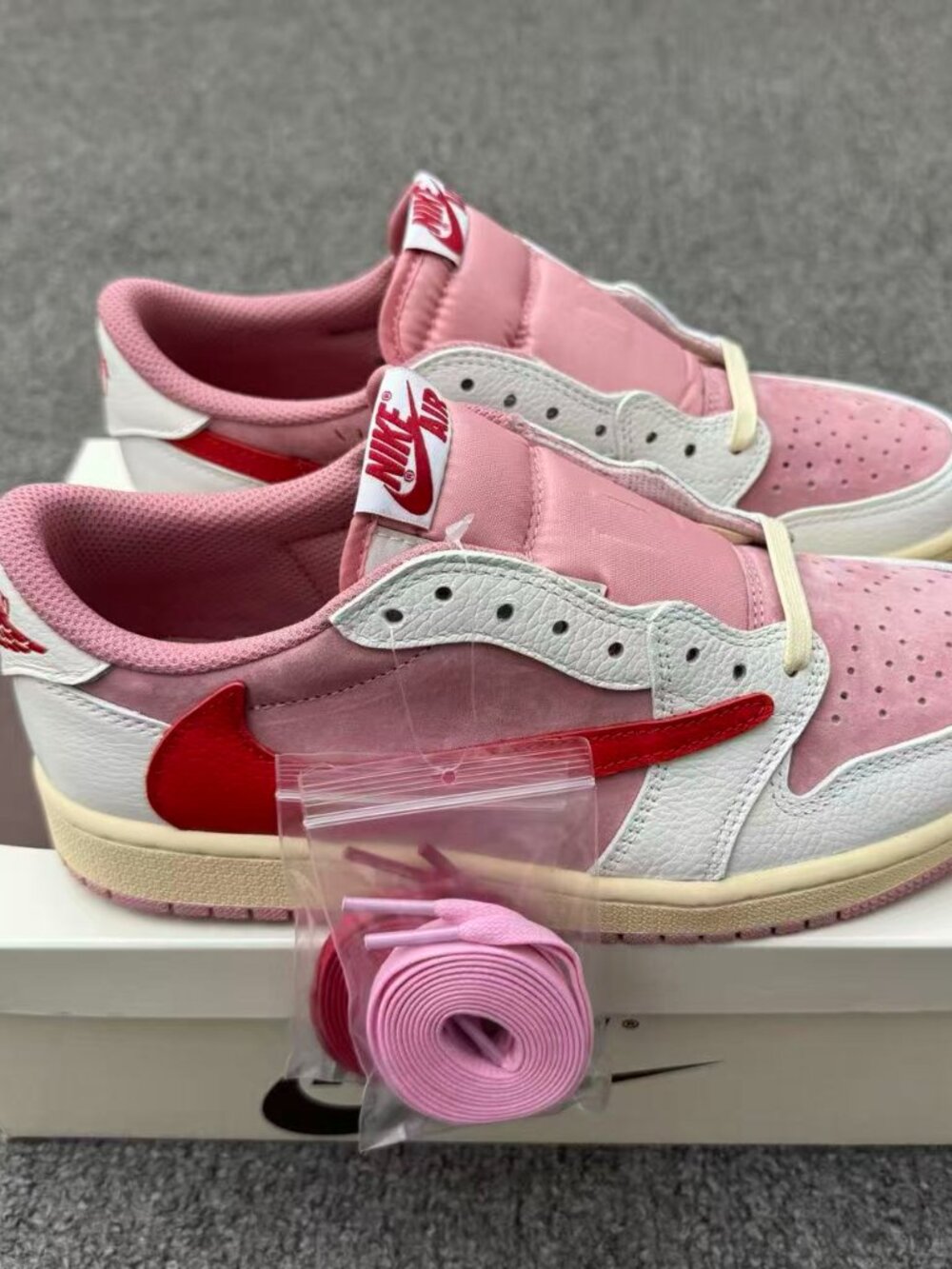 Jordan × Travis Scott Air Jordan 1 Low OG Shy Pink Reverse Swoosh Collaboration